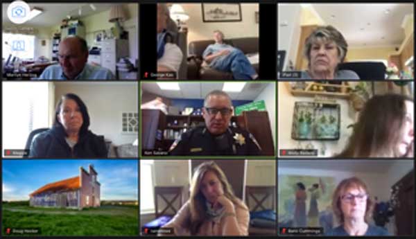 A group of people on a video call

Description automatically generated