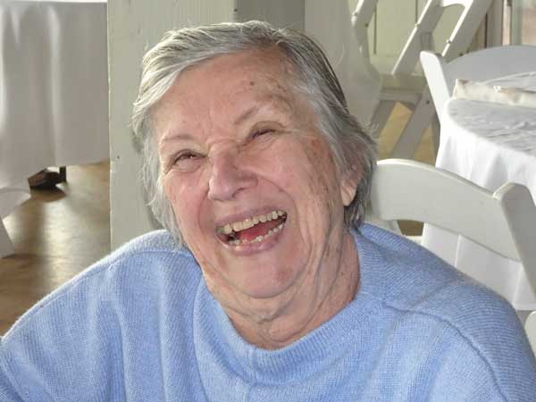 An old person laughing at something

Description automatically generated