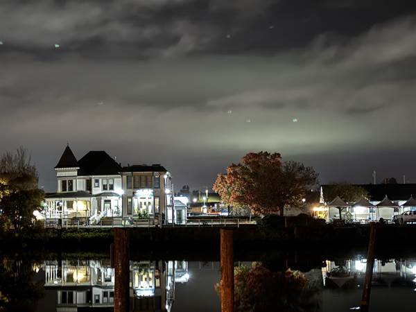 A house next to a body of water

Description automatically generated