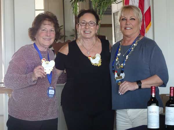 A group of women posing for a photo

Description automatically generated